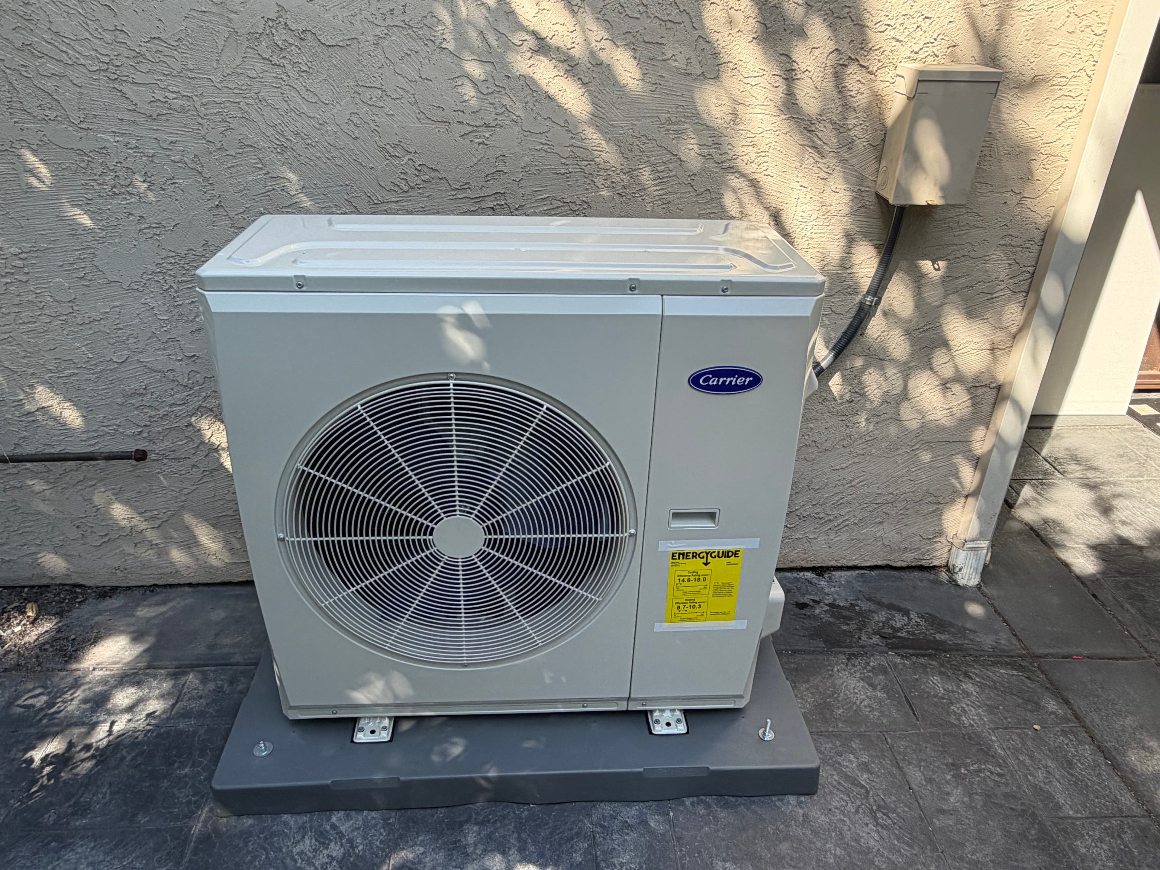 Carrier outdoor condenser unit on pad